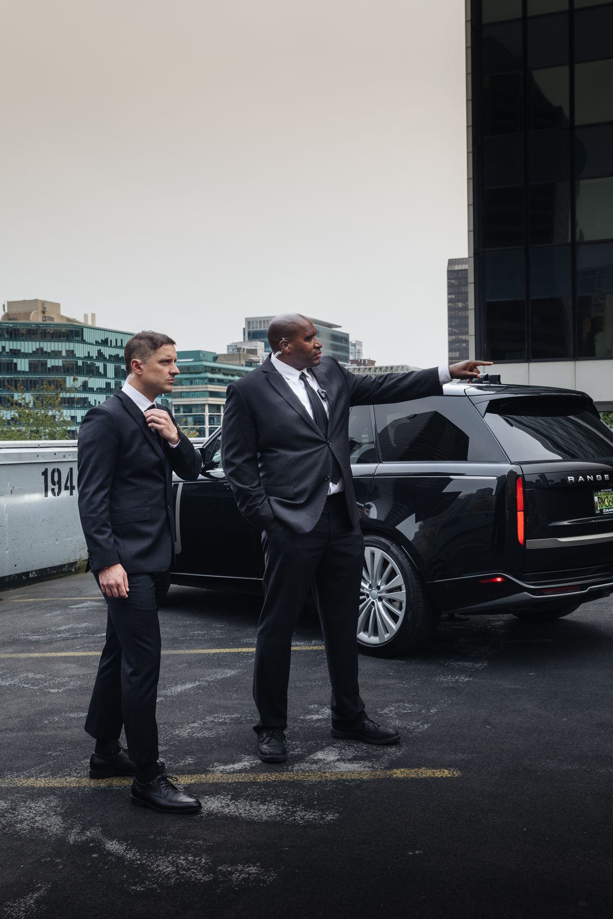 MI8 officers with a Cadillac on a Vancouver rooftop